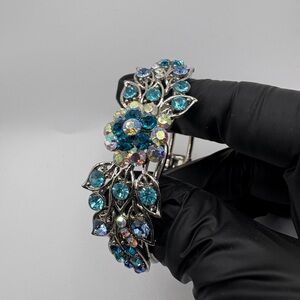 Vintage Silver-Tone Blue Rhinestone Hinged Cuff Bracelet – Statement Costume